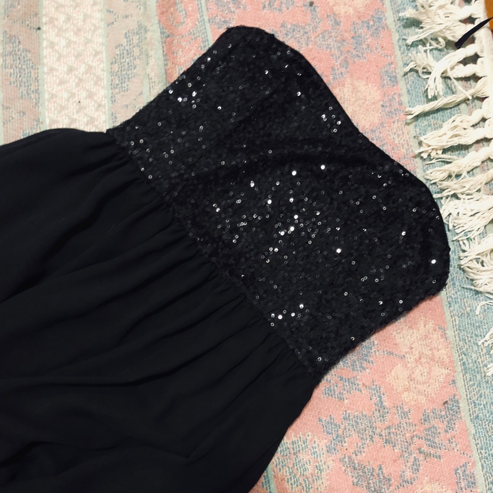 Black Sequin strapless maxi dress.